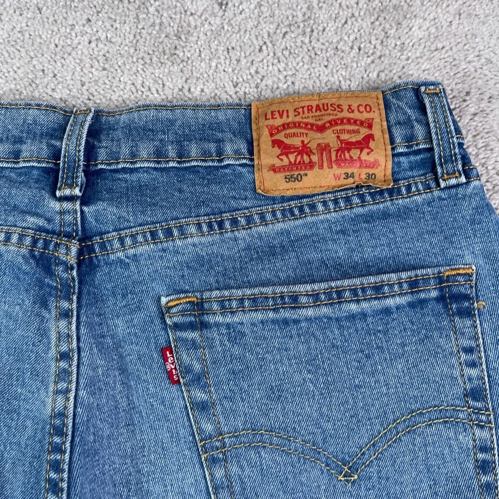 Levis Jeans Mens 34x30 Blue 550 Relaxed Fit Tapered Leg Stretch Denim Pants